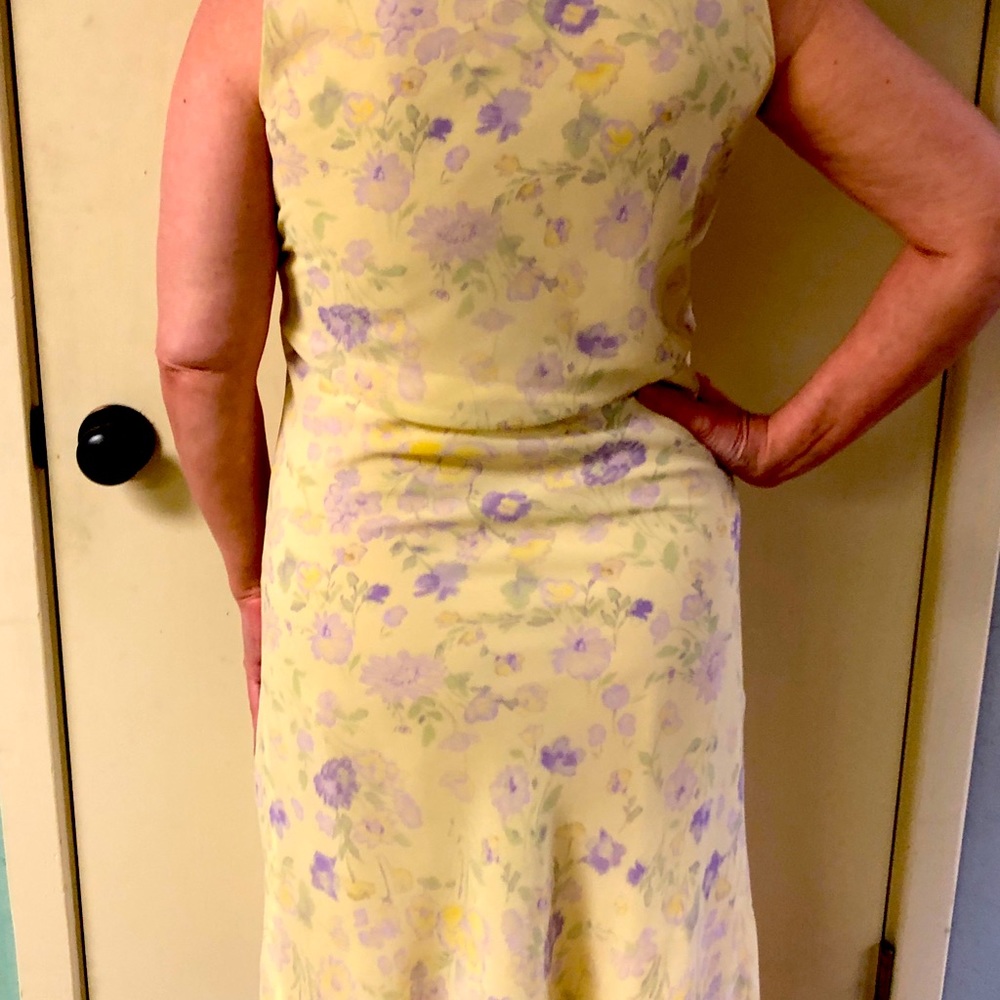Spring dress. Sleeveless and just below the knee.